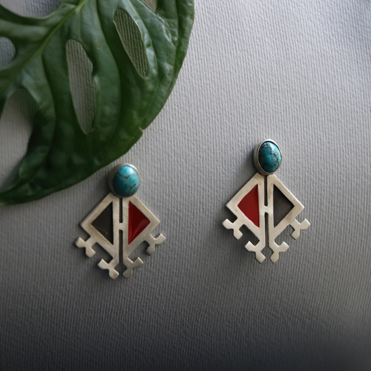 handmade triangular silver and enamel earrings decorated with Persian turquoise