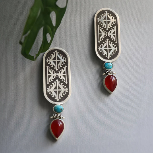 handmade oxidized silver drop earrings with geometric pattern decorated with turquoise and red onyx