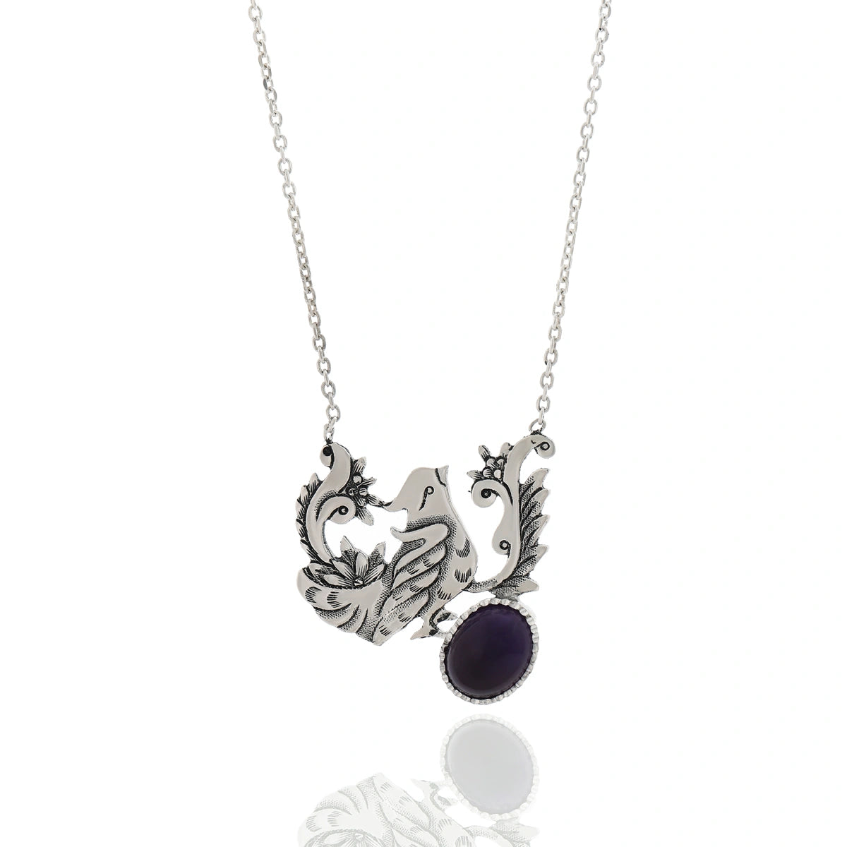 hand-engraved bird and branch silver necklace with oval amethyst