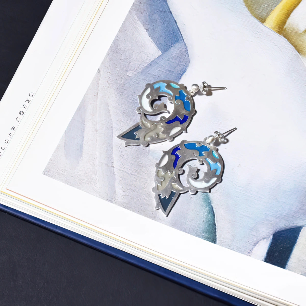 handmade dangle silver earrings decorated with blue enamel