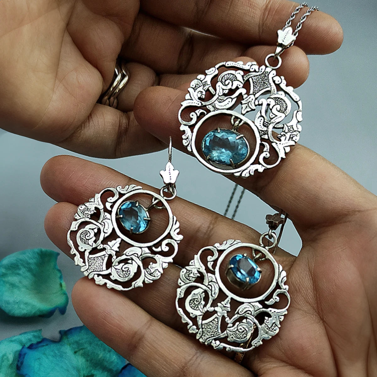 hand-engraved handmade floral silver jewelry set with blue topaz
