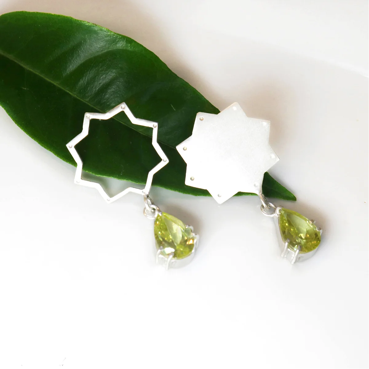 handmade silver mismatched star shaped stud dangle earrings with yellow cubic zirconia