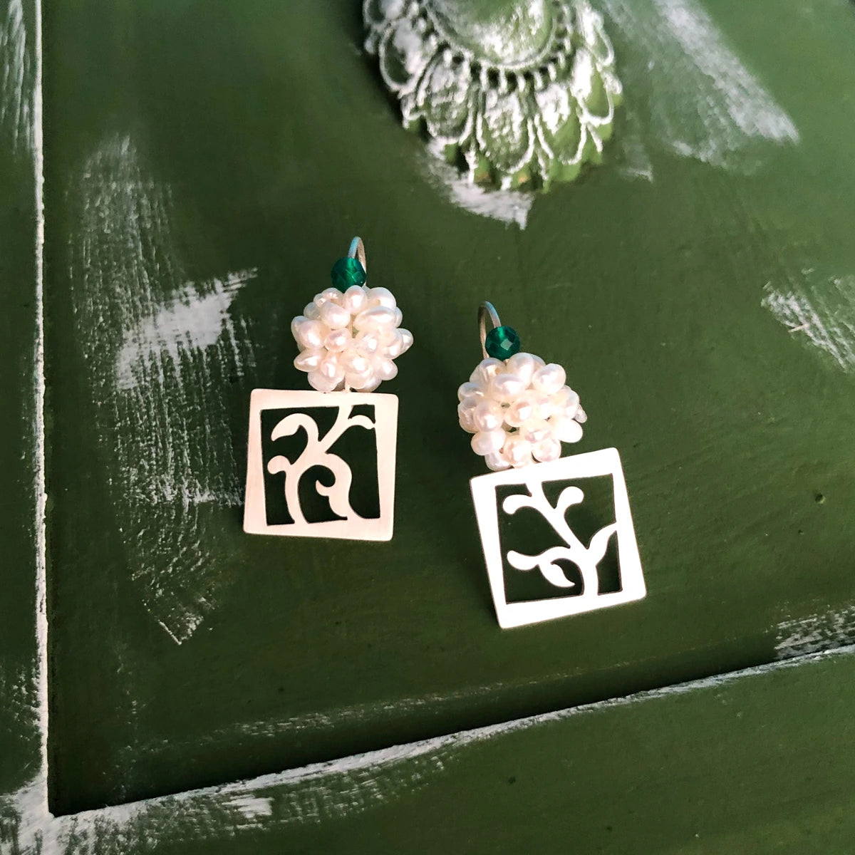 handmade openwork silver floral square drop earrings decorated with a cluster of cultured pearls and green agate