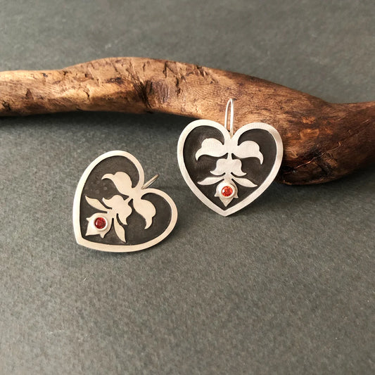 handmade heart-shaped silver earrings with motif and cubic zirconia