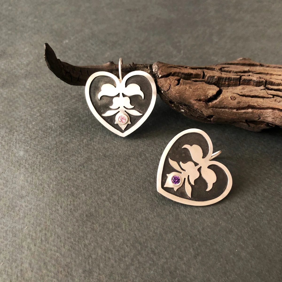 handmade heart-shaped silver earrings with motif and cubic zirconia