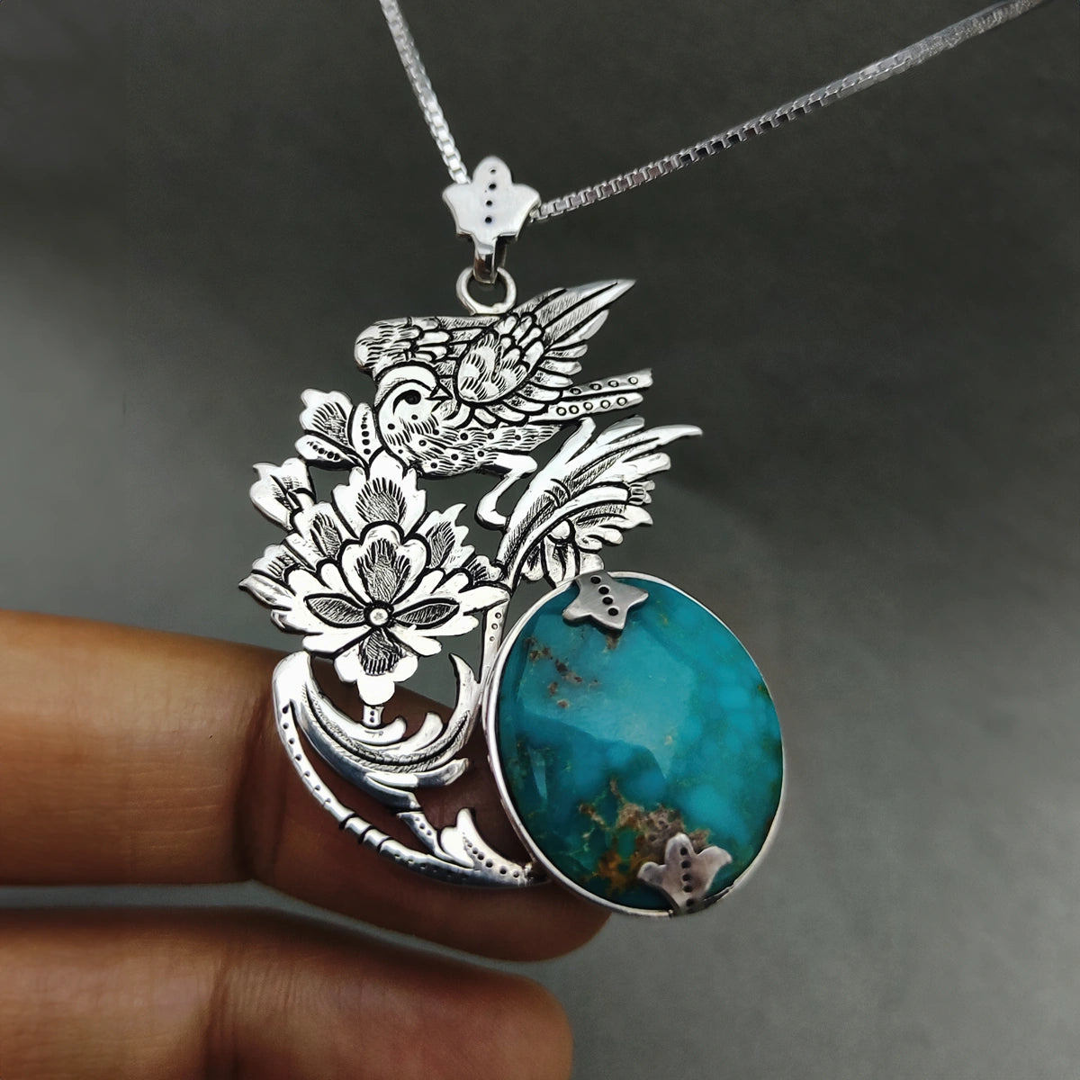 hand-engraved handmade bird and flower silver pendant necklace with turquoise