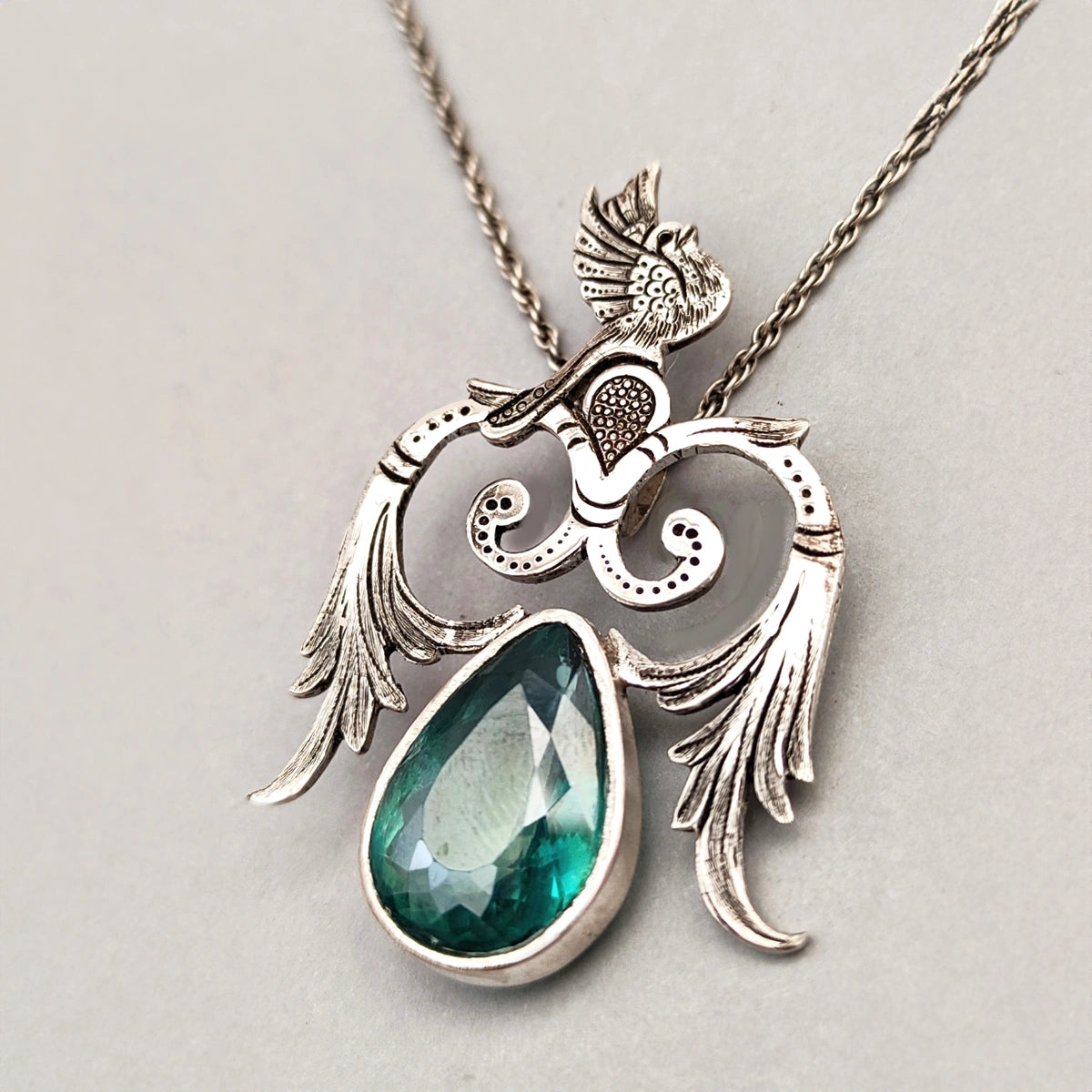 hand-engraved bird and branches silver pendant necklace with green topaz