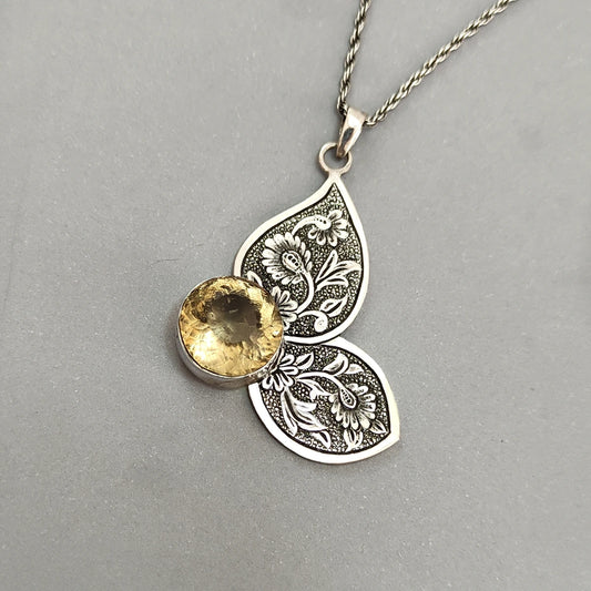 hand-engraved silver butterfly pendant necklace decorated with citrine
