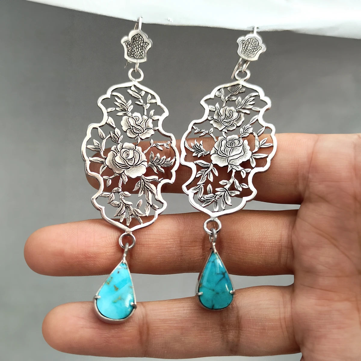 hand engraving silver statement earrings with rose patterns and teardrop Persian turquoise gemstones