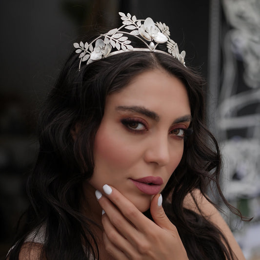 handmade silver tiara decorated with silver orchids and crystals and fake pearls