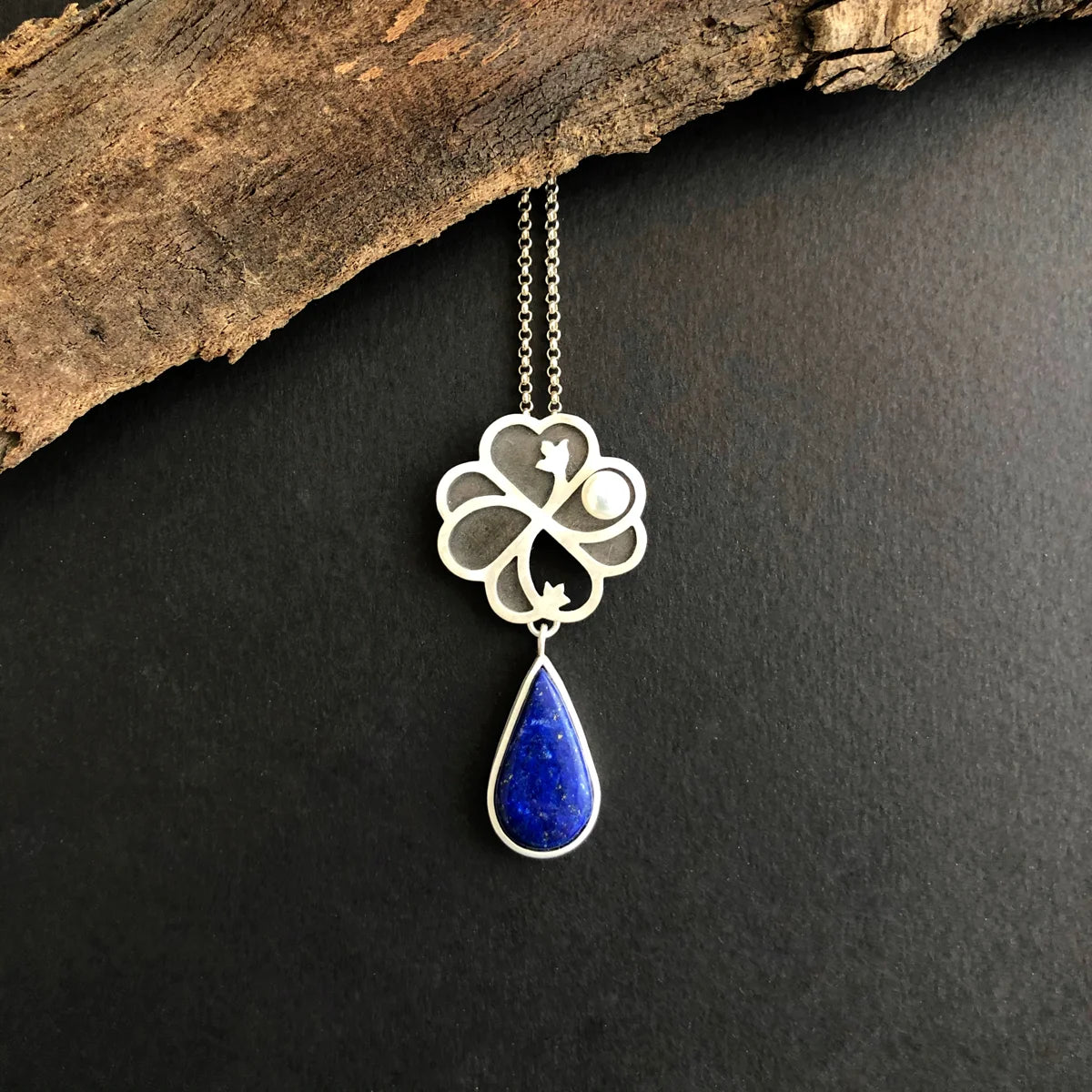 handmade oxidized silver openwork flower necklace with lapis lazuli and pearl