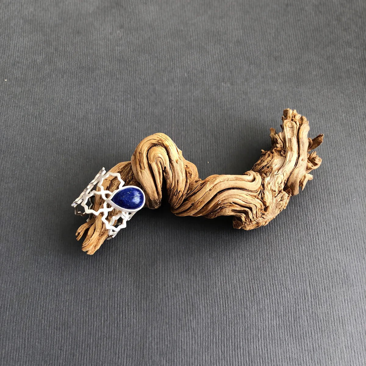 handmade silver openwork stars ring with teardrop lapis lazuli