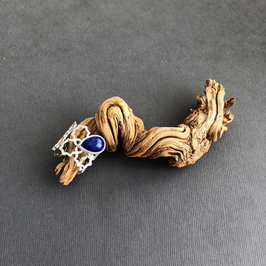 handmade silver openwork stars ring with teardrop lapis lazuli