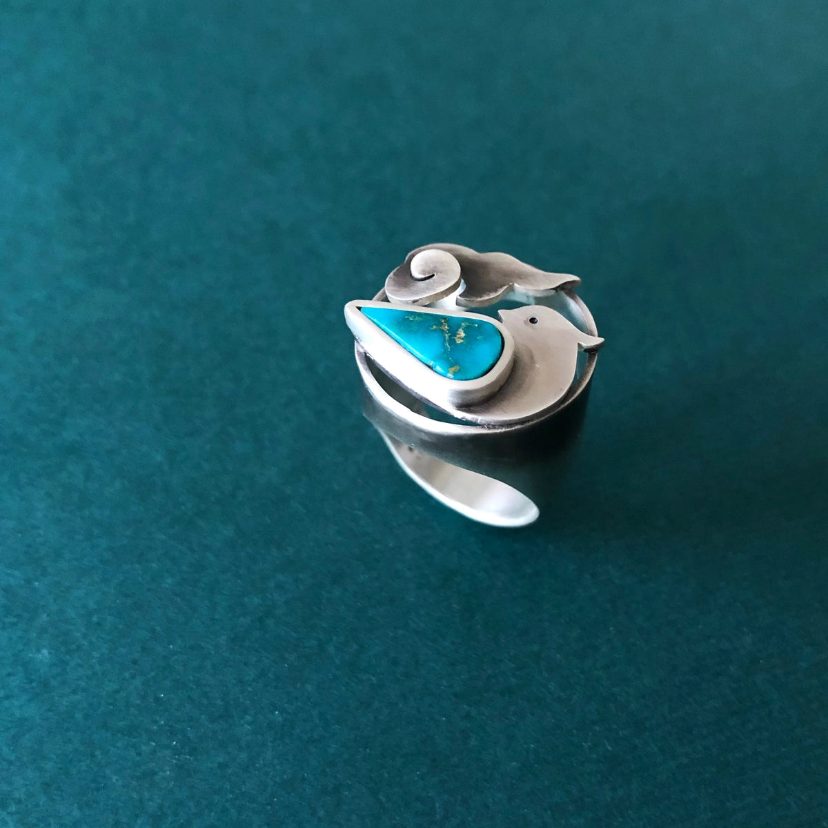 handmade bird and cloud statement silver ring with turquoise