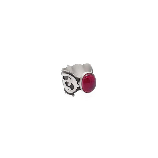 handmade silver statement ring decorated with oval ruby