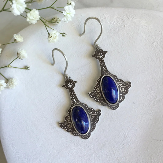 handcrafted oxidized silver dangle earrings, adorned with oval lapis lazuli