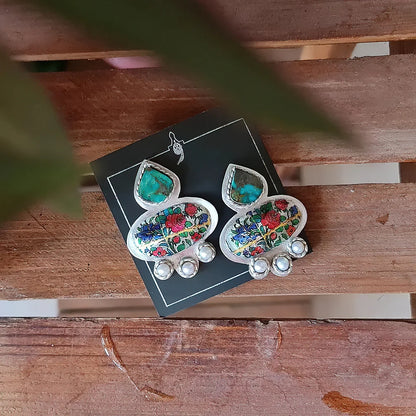 handcrafted silver statement stud earrings, decorated with multicolored floral patterns, pearls and turquoise