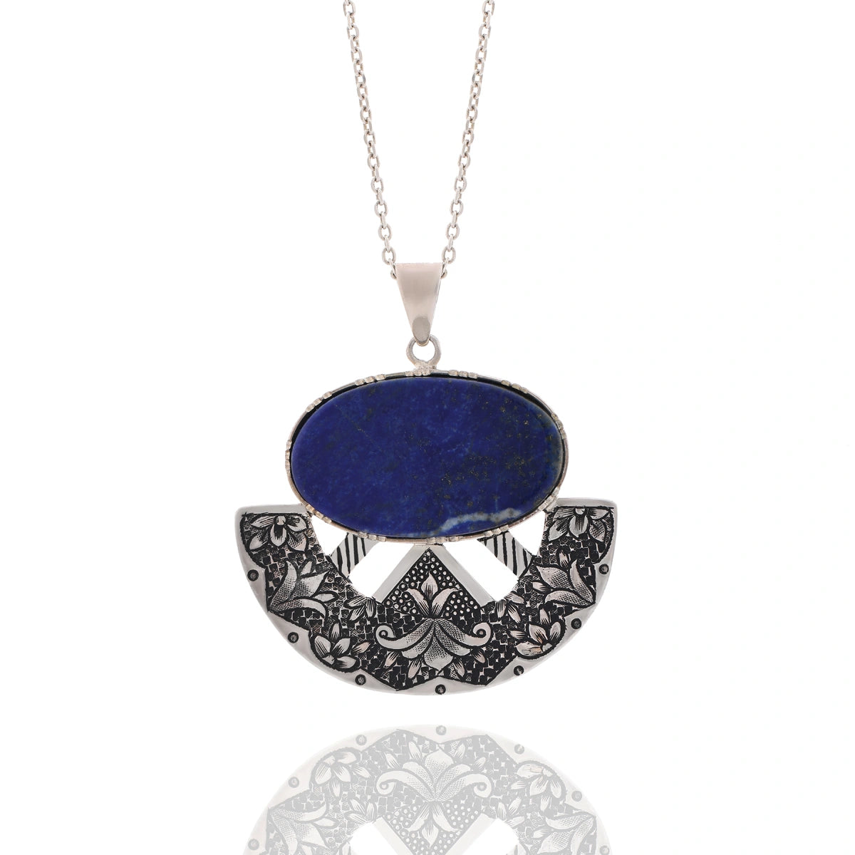 hand-engraved silver pendant necklace with floral motifs and lapis lazuli