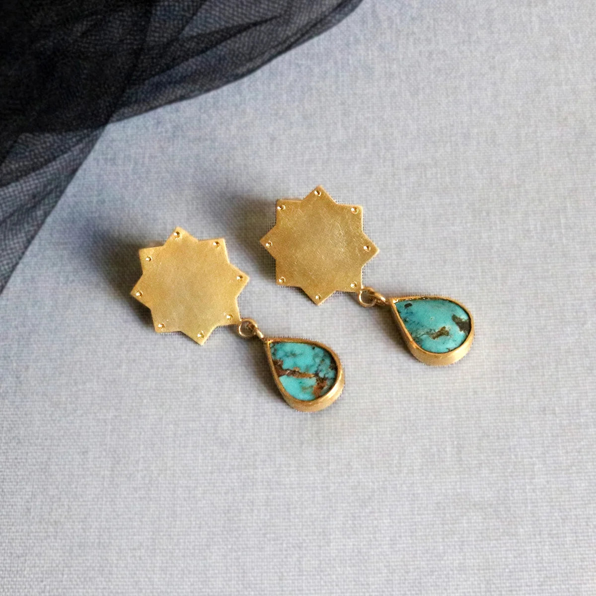 handmade gold plated silver star earrings with teardrop turquoise