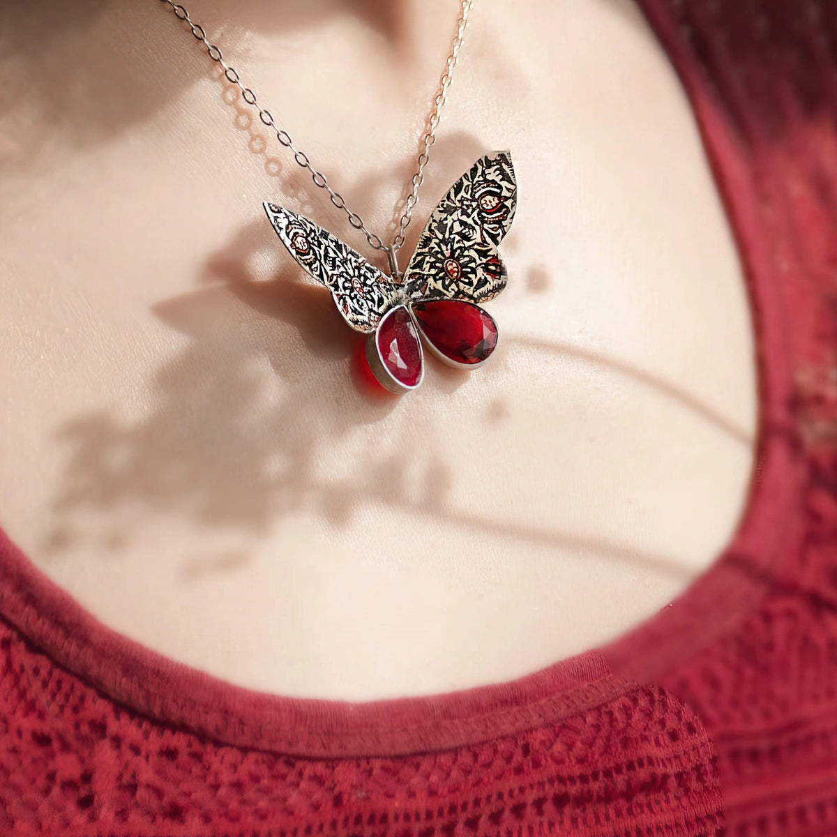 handmade butterfly silver necklace with red cubic zirconia