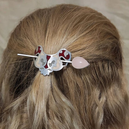 model wearing handmade silver and enamel stick barrette hair pin with rose quarts