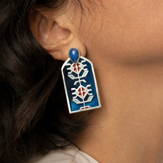 handmade silver statement earrings with geometric patterns, blue and red enamel accents and lapis lazuli