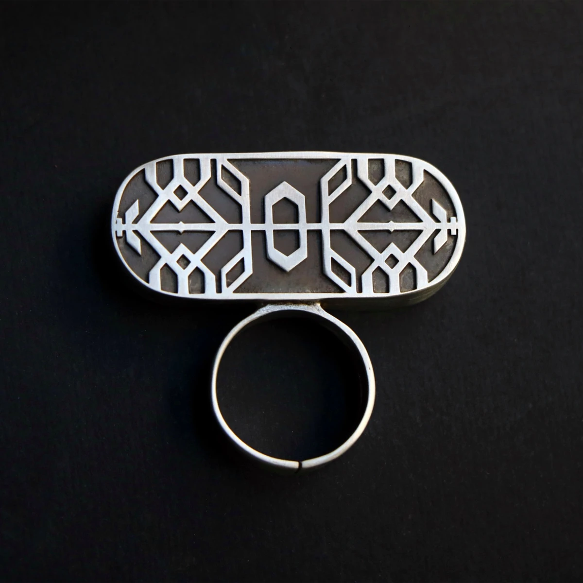 handmade oxidized silver statement ring with geometric patterns