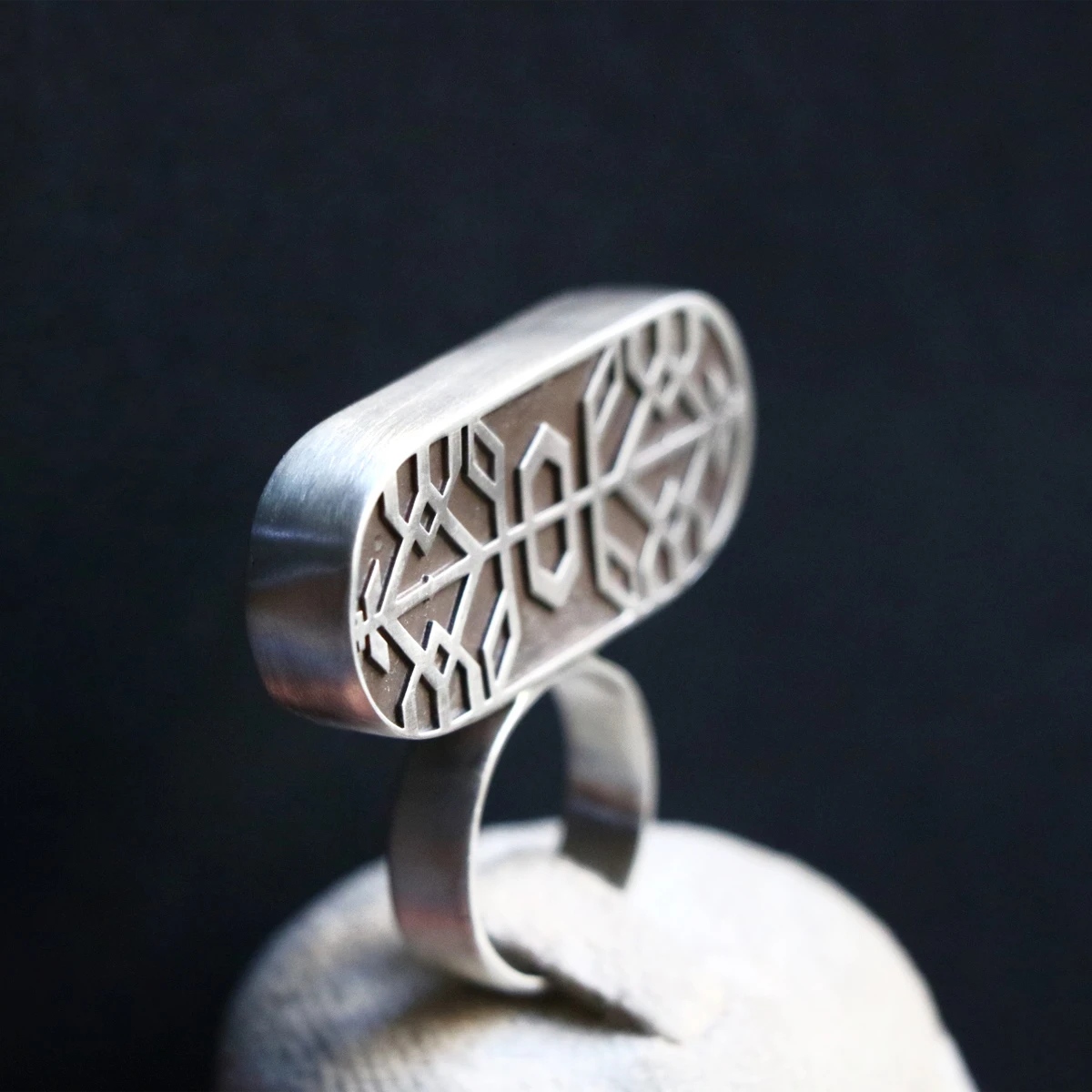 handmade oxidized silver statement ring with geometric patterns