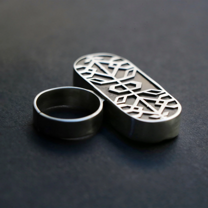 handmade oxidized silver statement ring with geometric patterns