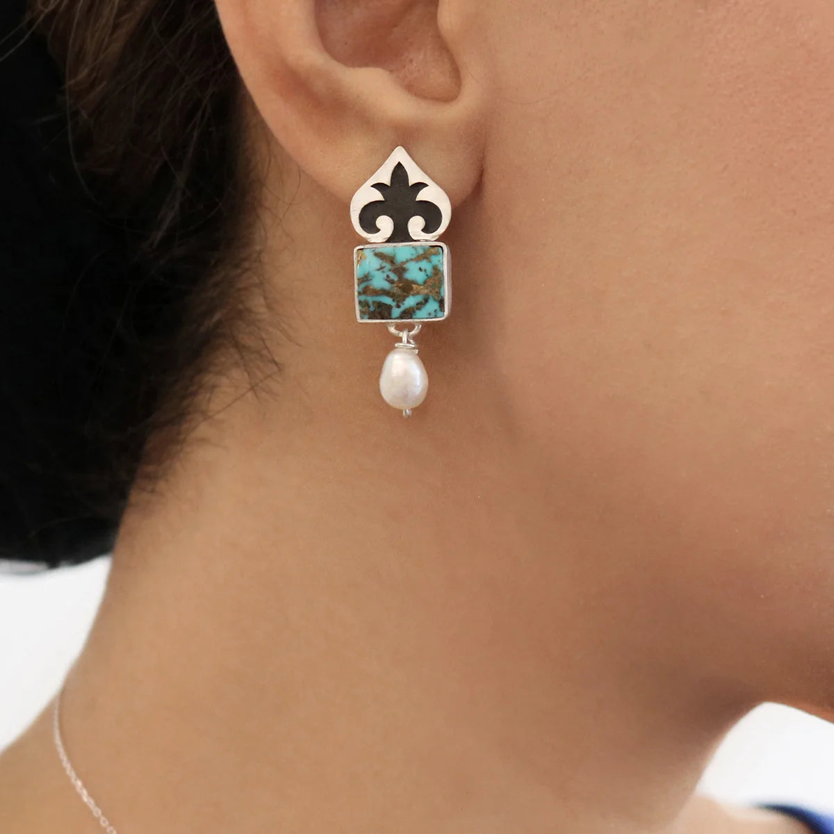 model wearing pomegranate blossom handmade drop earrings with turquoise and pearls