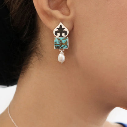 model wearing pomegranate blossom handmade drop earrings with turquoise and pearls