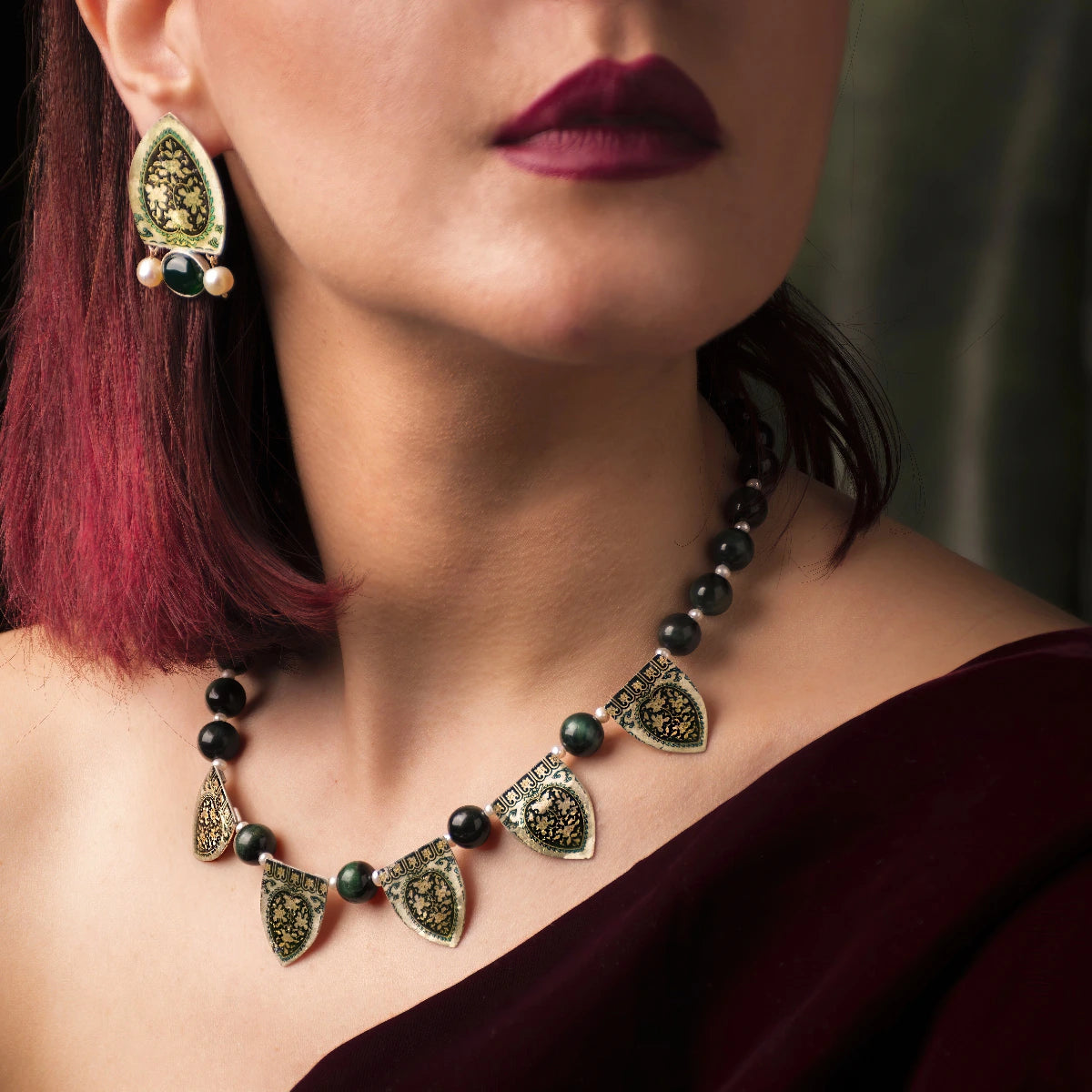 model wearing handmade jewerly set of earrings and necklace with green agate, pearls and tiger's eye