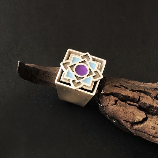 Handmade sterling silver statement ring with square band, geometric lotus design,  purple and blue enamel detailing.