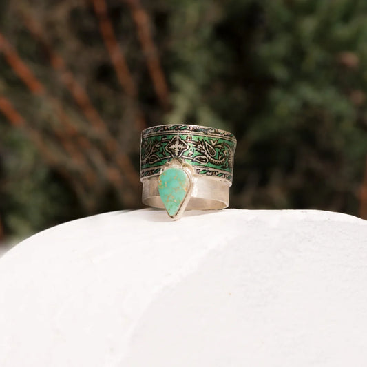 handmade statement silver ring with turquoise and green floral patterns