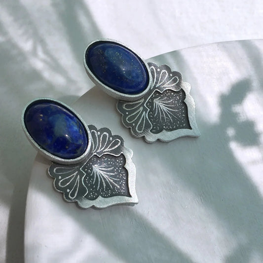 minimalistic oxidized silver stud earrings with oval lapis lazuli