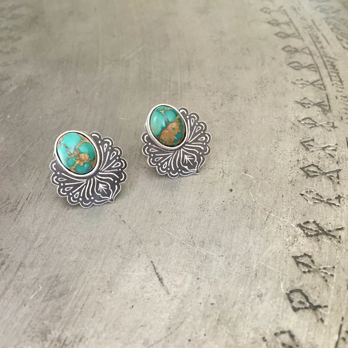 minimalistic oxidized silver stud earrings adorned with turquoise